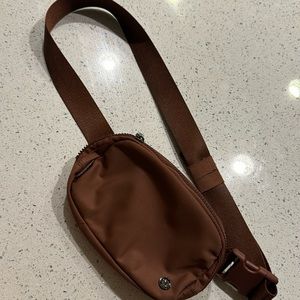 Brand new without tags reddish brown everywhere belt bag from lululemon.